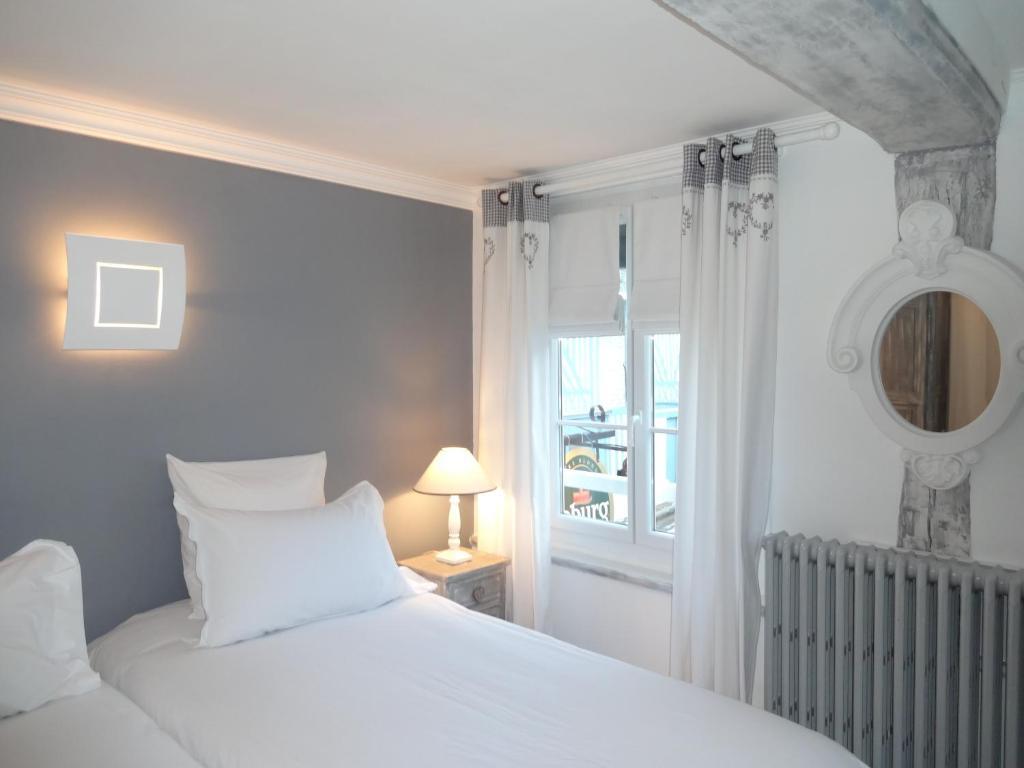 Hotel Le P'Tit Beaumont Quarto foto
